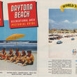 Load image into Gallery viewer, A vintage printed brochure or travel poster spread for Daytona Beach, Florida, showing beach scenes, people at the shore, and large red title panels reading 'Daytona Beach' and 'Recreational Area Pictures Guide.'.
