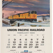 Load image into Gallery viewer, A vintage Union Pacific Railroad calendar page from February 1969, featuring a painted locomotive scene above a printed monthly calendar grid and centennial logo.
