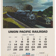 Load image into Gallery viewer, Vintage Union Pacific Railroad calendar page for July 1969, featuring a painted steam locomotive scene at the top and printed calendar grids below on an off-white background.
