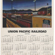 Load image into Gallery viewer, A vintage Union Pacific Railroad calendar page from 1970, featuring a large illustrated scene of a freight train passing through a yard at night above a full monthly calendar grid for the year.

